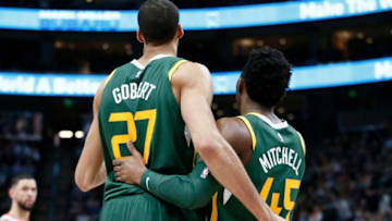SALT LAKE CITY, UT - FEBRUARY 2: Rudy Gobert #27, and Donovan Mitchell #45 of the Utah Jazz hug during the game against the Houston Rockets on February 2, 2019 at Vivint Smart Home Arena in Salt Lake City, Utah. Copyright 2019 NBAE (Photo by Chris Elise/NBAE via Getty Images)