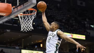 Feb 29, 2016; Milwaukee, WI, USA; Milwaukee Bucks forward Jabari Parker (12) attempts a dunk in the fourth quarter during the game against the Houston Rockets at BMO Harris Bradley Center. Parker scored 36 points as the Bucks beat the Rockets 128-121. Mandatory Credit: Benny Sieu-USA TODAY Sports