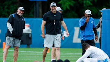 Detroit Lions head coach Dan Campbell watches warm up during mini camp at the practice facility in Allen Park on Tuesday, June 7, 2022.