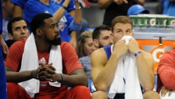 May 7, 2014; Oklahoma City, OK, USA; Los Angeles Clippers center DeAndre Jordan (6) and Los Angeles Clippers forward Blake Griffin (32) react to play against the OKlahoma City Thunder during the fourth quarter in game two of the second round of the 2014 NBA Playoffs at Chesapeake Energy Arena. Mandatory Credit: Mark D. Smith-USA TODAY Sports