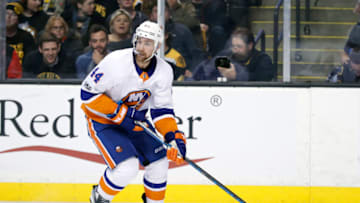 BOSTON, MA - DECEMBER 09: New York Islanders defenseman Calvin De Haan (44) looks to pass during a game between the Boston Bruins and the New York Islanders on December 9, 2017, at TD Garden in Boston, Massachusetts, The Bruins defeated the Islanders 3-1. (Photo by Fred Kfoury III/Icon Sportswire via Getty Images)