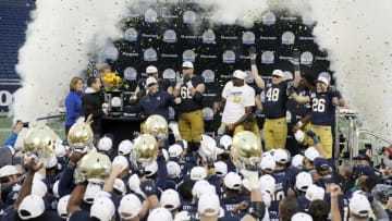 3ORLANDO, FL - JANUARY 01: Notre Dame Fighting Irish players celebrate following the Citrus Bowl against the LSU Tigers on January 1, 2018 in Orlando, Florida. Notre Dame won 21-17. (Photo by Joe Robbins/Getty Images)