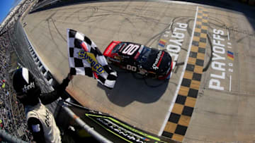 DOVER, DELAWARE - OCTOBER 05: Cole Custer, driver of the #00 Production Alliance Group Ford, takes the checkered flag to win the NASCAR Xfinity Series Use Your Melon Drive Sober 200 at Dover International Speedway on October 05, 2019 in Dover, Delaware. (Photo by Chris Trotman/Getty Images)