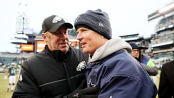PHILADELPHIA, PENNSYLVANIA - DECEMBER 31: Head coach Doug Pederson of the Philadelphia Eagles greets head coach Jason Garrett of the Dallas Cowboys after the game at Lincoln Financial Field on December 31, 2017 in Philadelphia, Pennsylvania. (Photo by Elsa/Getty Images)