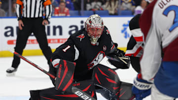 Oct 29, 2023; Buffalo, New York, USA; Buffalo Sabres goaltender Ukko-Pekka Luukkonen (1) looks for the loose puck during the first period against the Colorado Avalanche at KeyBank Center. Mandatory Credit: Timothy T. Ludwig-USA TODAY Sports