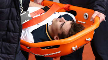 BURNLEY, ENGLAND - APRIL 01: Harry Winks of Tottenham Hotspur is stretchered off during the Premier League match between Burnley and Tottenham Hotspur at Turf Moor on April 1, 2017 in Burnley, England. (Photo by Jan Kruger/Getty Images)
