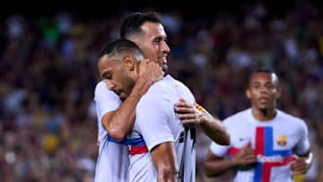 BARCELONA, SPAIN - AUGUST 24: Pierre-Emerick Aubameyang of FC Barcelona celebrates with Sergio Busquets after scoring his team's first goal during the friendly match between FC Barcelona and Manchester City at Spotify Camp Nou on August 24, 2022 in Barcelona, Spain. (Photo by Alex Caparros/Getty Images)