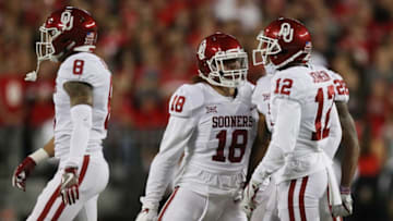 COLUMBUS, OH - SEPTEMBER 09: Curtis Bolton #18 reacts with Will Johnson #12 of the Oklahoma Sooners during the first half against the Ohio State Buckeyes at Ohio Stadium on September 9, 2017 in Columbus, Ohio. (Photo by Gregory Shamus/Getty Images)