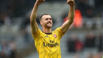 NEWCASTLE UPON TYNE, ENGLAND - AUGUST 11: Calum Chambers of Arsenal celebrates at full time during the Premier League match between Newcastle United and Arsenal FC at St. James Park on August 11, 2019 in Newcastle upon Tyne, United Kingdom. (Photo by Robbie Jay Barratt - AMA/Getty Images)
