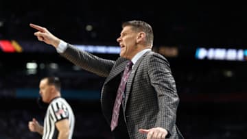 SAN ANTONIO, TX - MARCH 31: Head coach Porter Moser of the Loyola Ramblers reacts against the Michigan Wolverines in the first half during the 2018 NCAA Men's Final Four Semifinal at the Alamodome on March 31, 2018 in San Antonio, Texas. (Photo by Ronald Martinez/Getty Images)