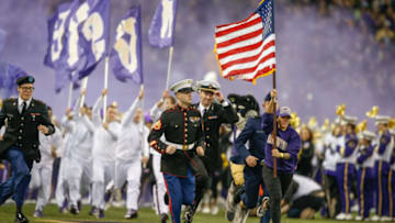 SEATTLE, WA - NOVEMBER 18: The American flag is presented prior to the game between the Washington Huskies and the Utah Utes at Husky Stadium on November 18, 2017 in Seattle, Washington. (Photo by Otto Greule Jr/Getty Images)