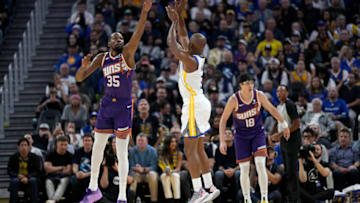 SAN FRANCISCO, CALIFORNIA - OCTOBER 24: Chris Paul #3 of the Golden State Warriors shoots over Kevin Durant #35 of the Phoenix Suns during the second quarter at Chase Center on October 24, 2023 in San Francisco, California. NOTE TO USER: User expressly acknowledges and agrees that, by downloading and or using this photograph, User is consenting to the terms and conditions of the Getty Images License Agreement. (Photo by Thearon W. Henderson/Getty Images)