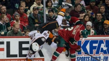Dec 5, 2014; Saint Paul, MN, USA; Minnesota Wild defenseman Keith Ballard (2) checks Anaheim Ducks forward Corey Perry (10) during the first period at Xcel Energy Center. Mandatory Credit: Brace Hemmelgarn-USA TODAY Sports