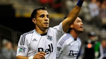 Vancouver Whitecaps forward Camilo Sanvezzo (7) after scoring against Chivas USA goalkeeper Dan Kennedy (1) (not pictured) during the first half at BC Place Stadium. (Anne-Marie Sorvin, USA TODAY Sports)