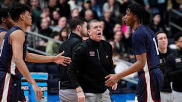 Mar 17, 2023; Columbus, Ohio, USA; Fairleigh Dickinson Knights head coach Tobin Anderson talks to guard Joe Munden Jr. (1) during the first round of the NCAA menâ€™s basketball tournament against the Purdue Boilermakers at Nationwide Arena. Marquette won 78-61. Mandatory Credit: Adam Cairns-The Columbus DispatchBasketball Ncaa Men S Basketball TournamentSyndication The Columbus Dispatch