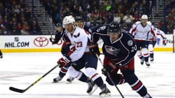 Jan 2, 2016; Columbus, OH, USA; Columbus Blue Jackets left wing Brandon Saad (20) skates with the puck as Washington Capitals left wing Zach Sill (23) trails the play during the second period at Nationwide Arena. Mandatory Credit: Russell LaBounty-USA TODAY Sports