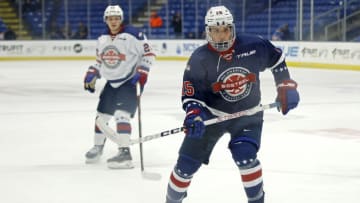 PLYMOUTH, MICHIGAN - JANUARY 16: Ryan Leonard #15 skates to the corner in the third period of the 2023 BioSteel All-American game at USA Hockey Arena on January 16, 2023 in Plymouth, Michigan. (Photo by Mike Mulholland/Getty Images)