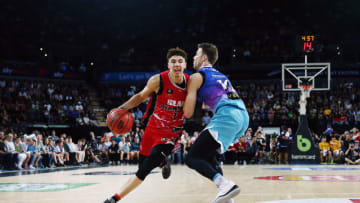 AUCKLAND, NEW ZEALAND - NOVEMBER 30: LaMelo Ball of the Hawks drives against Tom Abercrombie of the Breakers during the round 9 NBL match between the New Zealand Breakers and the Illawarra Hawks at Spark Arena on November 30, 2019 in Auckland, New Zealand. (Photo by Anthony Au-Yeung/Getty Images)