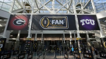 TCU Horned Frogs and Georgia Bulldogs logos at the Los Angeles Convention Center, the site of the Playoff Fan Central. Mandatory Credit: Kirby Lee-USA TODAY Sports