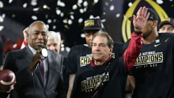 Jan 11, 2016; Glendale, AZ, USA; Alabama Crimson Tide head coach Nick Saban waves during the trophy ceremony after the game against the Clemson Tigers in the 2016 CFP National Championship at University of Phoenix Stadium. Alabama won 45-40. Mandatory Credit: Matthew Emmons-USA TODAY Sports