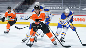 PHILADELPHIA, PA - JANUARY 18: Nicolas Aube-Kubel #62 of the Philadelphia Flyers moves the puck against the Buffalo Sabres in the first period at Wells Fargo Center on January 18, 2021 in Philadelphia, Pennsylvania. (Photo by Drew Hallowell/Getty Images)