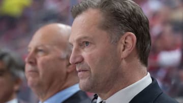 DETROIT, MI - NOVEMBER 30: Associate coach Kirk Muller of the Montreal Canadiens watches the action from the bench against the Detroit Red Wings during an NHL game at Little Caesars Arena on November 30, 2017 in Detroit, Michigan. The Canadiens defeated the Red Wings 6-3. (Photo by Dave Reginek/NHLI via Getty Images)