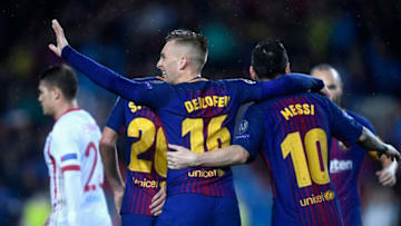 BARCELONA, SPAIN - OCTOBER 18: Gerard Deulofeu of Barcelona celebrates his sides first goal with Lionel Messi of Barcelona during the UEFA Champions League group D match between FC Barcelona and Olympiakos Piraeus at Camp Nou on October 18, 2017 in Barcelona, Spain. (Photo by Alex Caparros/Getty Images)