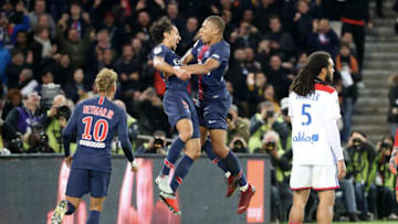 PARIS, FRANCE - OCTOBER 07: Kylian Mbappe of Paris Saint-Germain celebrates his fourth goal with Marquinhos and Neymar Jr during the French Ligue 1 match between Paris Saint Germain and Olympique Lyon on October 07, 2018 in Paris, France. (Photo by Xavier Laine/Getty Images)