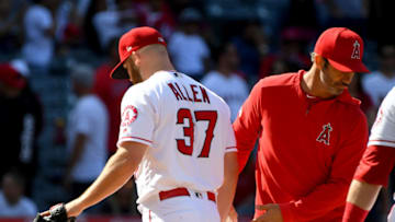 ANAHEIM, CA - APRIL 21: Manager Brad Ausmus #12 pulls relief pitcher Cody Allen #37 of the Los Angeles Angels of Anaheim after he gave up a two run home run to Mitch Haniger #17 of the Seattle Mariners in the ninth inning of the game at Angel Stadium of Anaheim on April 21, 2019 in Anaheim, California. (Photo by Jayne Kamin-Oncea/Getty Images)