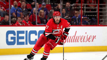 RALEIGH, NC - MARCH 31: Justin Faulk #27 of the Carolina Hurricanes skates with the puck during an NHL game against the New York Rangers on March 31, 2018 at PNC Arena in Raleigh, North Carolina. (Photo by Gregg Forwerck/NHLI via Getty Images)