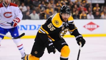 May 3, 2014; Boston, MA, USA; Boston Bruins defenseman Johnny Boychuk (55) chases the puck in the corner during the third period against the Montreal Canadiens in game two of the second round of the 2014 Stanley Cup Playoffs at TD Banknorth Garden. Mandatory Credit: Bob DeChiara-USA TODAY Sports