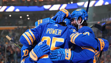 BUFFALO, NY - APRIL 14: Playing in his home debut NHL 1st overall pick Owen Power #25 of the Buffalo Sabres gets his first NHL point assisting on a goal by Alex Tuch #89 of the Buffalo Sabres during the second period against the St. Louis Blues at KeyBank Center on April 14, 2022 in Buffalo, New York. (Photo by Kevin Hoffman/Getty Images)