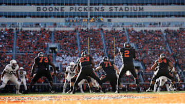 STILLWATER, OK - NOVEMBER 7 : Quarterback Mason Rudolph #2 of the Oklahoma State Cowboys takes a snap against the TCU Horned Frogs November 7, 2015 at Boone Pickens Stadium in Stillwater, Oklahoma. The Cowboys defeated the Horned Frogs 49-29. (Photo by Brett Deering/Getty Images)