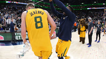 SALT LAKE CITY, UT - MARCH 13: Donovan Mitchell #45 of the Utah Jazz celebrates with Jonas Jerebko #8 after defeating the Detroit Pistons on March 13, 2018 at vivint.SmartHome Arena in Salt Lake City, Utah. Copyright 2018 NBAE (Photo by Melissa Majchrzak/NBAE via Getty Images)