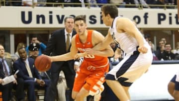 Dec 30, 2015; Pittsburgh, PA, USA; Syracuse Orange forward Tyler Lydon (20) drives to the basket as Pittsburgh Panthers forward Rafael Maia (R) defends during the first half at the Petersen Events Center. PITT won 72-61. Photo Credit: Charles LeClaire-USA TODAY Sports
