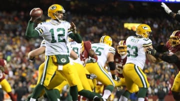 Nov 20, 2016; Landover, MD, USA; Green Bay Packers quarterback Aaron Rodgers (12) throws the ball against the Washington Redskins in the third quarter at FedEx Field. The Redskins won 42-24. Mandatory Credit: Geoff Burke-USA TODAY Sports