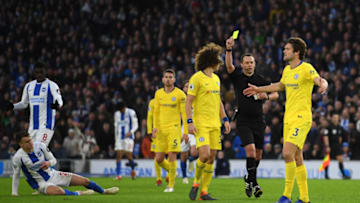 BRIGHTON, ENGLAND - DECEMBER 16: Marcos Alonso of Chelsea is shown a yellow card during the Premier League match between Brighton & Hove Albion and Chelsea FC at American Express Community Stadium on December 16, 2018 in Brighton, United Kingdom. (Photo by Mike Hewitt/Getty Images)