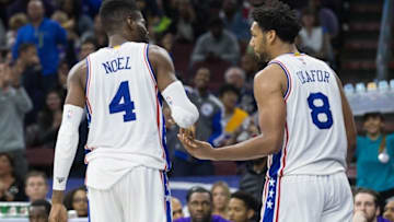 Dec 1, 2015; Philadelphia, PA, USA; Philadelphia 76ers forward Nerlens Noel (4) and center Jahlil Okafor (8) celebrate a score against the Los Angeles Lakers during the second half at Wells Fargo Center. The 76ers won 103-91. Mandatory Credit: Bill Streicher-USA TODAY Sports