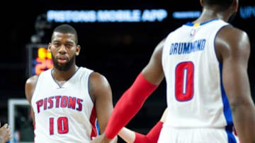 Dec 26, 2014; Auburn Hills, MI, USA; Detroit Pistons center Andre Drummond (0) high fives forward Greg Monroe (10) during the first quarter against the Indiana Pacers at The Palace of Auburn Hills. Mandatory Credit: Tim Fuller-USA TODAY Sports