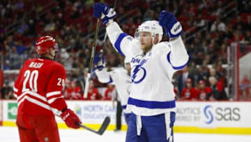 Feb 21, 2016; Raleigh, NC, USA; Tampa Bay Lightning forward Steven Stamkos (91) celebrates scoring the game winning goal during the third period against the Carolina Hurricanes at PNC Arena. The Tampa Bay Lightning defeated the Carolina Hurricanes 4-2. Mandatory Credit: James Guillory-USA TODAY Sports