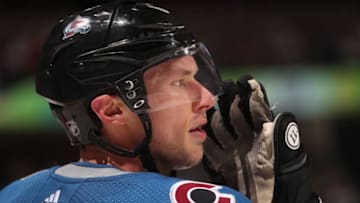 DENVER, CO - MARCH 24: Erik Johnson #6 of the Colorado Avalanche talks to a teammate against the Vegas Golden Knights at the Pepsi Center on March 24, 2018 in Denver, Colorado. (Photo by Michael Martin/NHLI via Getty Images)
