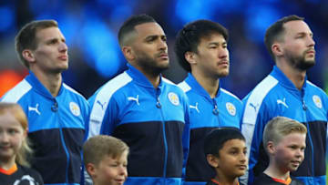 LEICESTER, ENGLAND - APRIL 18: Danny Simpson of Leicester City and Shinji Okazaki of Leicester City line up prior to the UEFA Champions League Quarter Final second leg match between Leicester City and Club Atletico de Madrid at The King Power Stadium on April 18, 2017 in Leicester, United Kingdom. (Photo by Clive Rose/Getty Images)