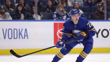 Jan 11, 2022; Buffalo, New York, USA; Buffalo Sabres right wing Jack Quinn (22) looks for the puck during his first career NHL game in the second period against the Tampa Bay Lightning at KeyBank Center. Mandatory Credit: Timothy T. Ludwig-USA TODAY Sports