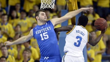 Dec 3, 2015; Los Angeles, CA, USA; UCLA Bruins guard Aaron Holiday (3) shoots the ball against Kentucky Wildcats forward Isaac Humphries (15) during the first half at Pauley Pavilion. Mandatory Credit: Richard Mackson-USA TODAY Sports