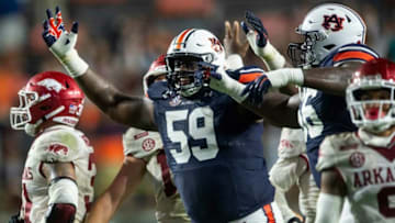 Auburn football offensive lineman Brodarious Hamm (59) reacts to the game winning field goal at Jordan Hare Stadium in Auburn, Ala., on Saturday, Oct. 10, 2020. Auburn defeated Arkansas 30-28.
