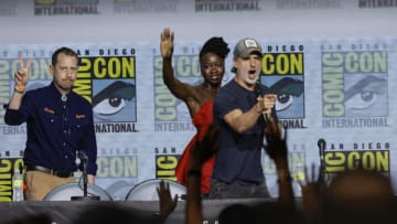 SAN DIEGO, CALIFORNIA - JULY 22: (L-R) Scott M. Gimple, Danai Gurira, and Andrew Lincoln speak onstage at AMC's "The Walking Dead" panel during 2022 Comic-Con International: San Diego at San Diego Convention Center on July 22, 2022 in San Diego, California. (Photo by Kevin Winter/Getty Images)