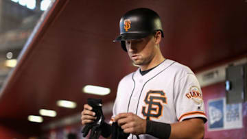 PHOENIX, AZ - JULY 01: Joe Panik #12 of the San Francisco Giants prepares to bat during the sixth inning of the MLB game against the Arizona Diamondbacks at Chase Field on July 1, 2018 in Phoenix, Arizona. (Photo by Christian Petersen/Getty Images)