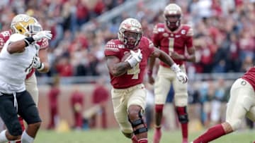 TALLAHASSEE, FL - NOVEMBER 16: Runningback Khalan Laborn #4 of the Florida State Seminoles on a running play during the game against the Alabama State Hornets at Doak Campbell Stadium on Bobby Bowden Field on November 16, 2019 in Tallahassee, Florida. The Seminoles defeated The Hornets 49 to 12. (Photo by Don Juan Moore/Getty Images)