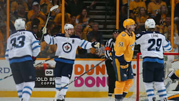 NASHVILLE, TN - APRIL 29: Mark Scheifele #55 of the Winnipeg Jets celebrates after a goal against the Nashville Predators during the first period in Game Two of the Western Conference Second Round during the 2018 NHL Stanley Cup Playoffs at Bridgestone Arena on April 29, 2018 in Nashville, Tennessee. (Photo by Frederick Breedon/Getty Images)