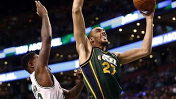 Feb 29, 2016; Boston, MA, USA; Utah Jazz center Rudy Gobert (27) shoots the ball against Boston Celtics forward Amir Johnson (90) during the second half at TD Garden. Mandatory Credit: Mark L. Baer-USA TODAY Sports